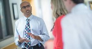 Dr. Ravi Jhaveri, an infectious disease specialist at the University of North Carolina at Chapel Hill School of Medicine, talks to parents.